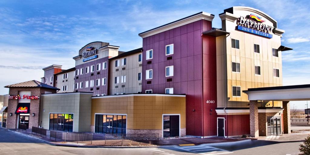 a rendering of the front of a hotel at Baymont by Wyndham Rapid City in Rapid City