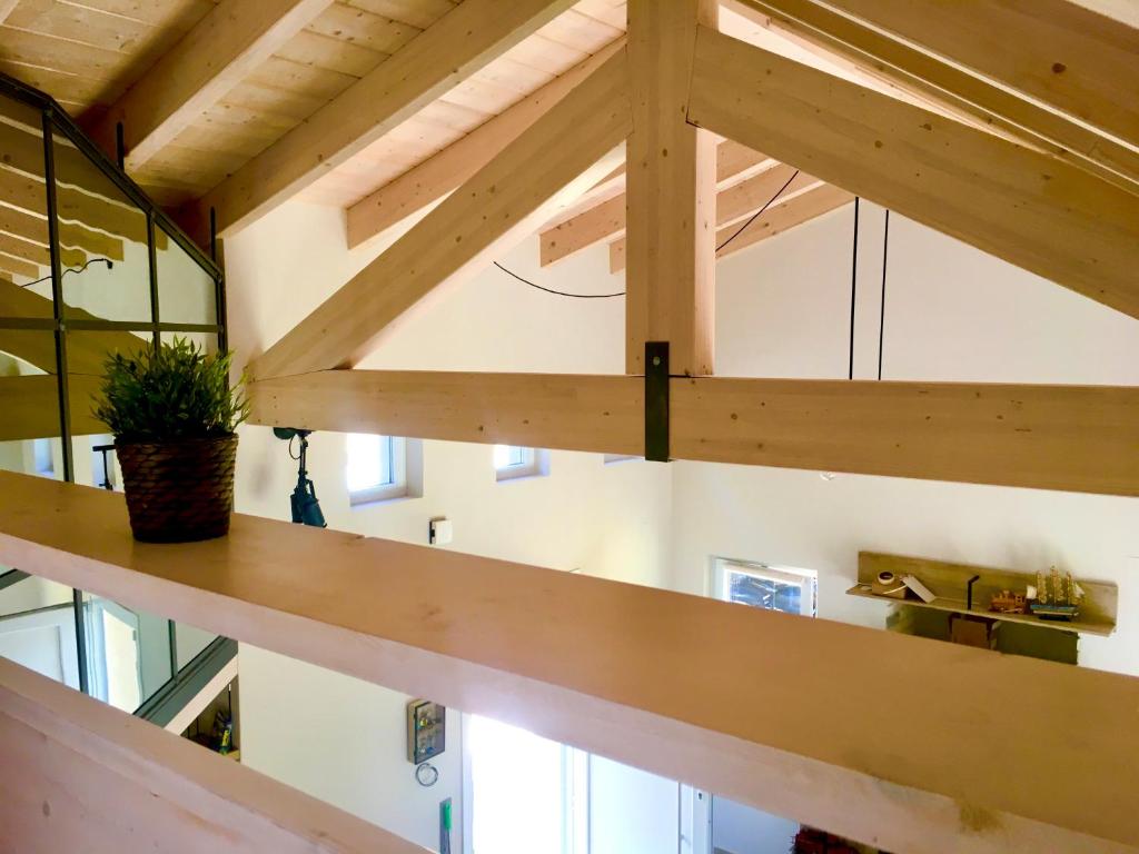 a view of a room with wooden beams at Anna's cottage house in Perama