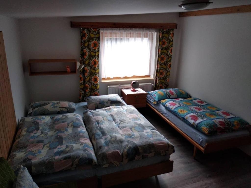 Krevet ili kreveti u jedinici u objektu Prázdninový dům s finskou saunou a bazénem