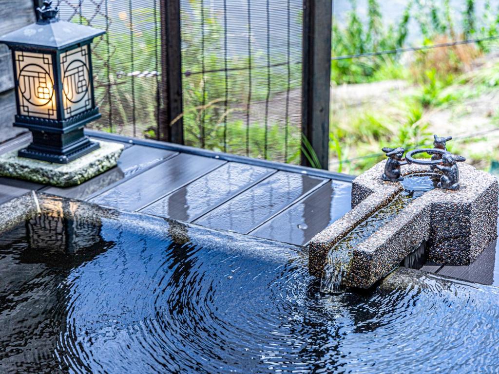 Zahrada ubytování Kameyama Onsen Hotel