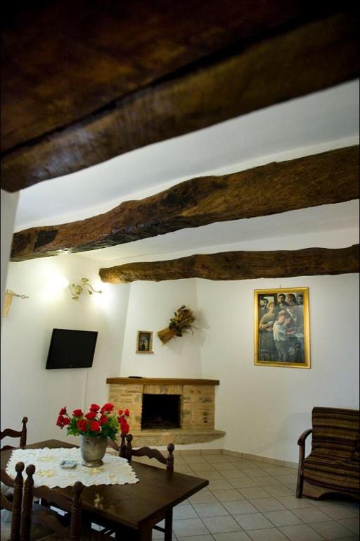 Televízia a/alebo spoločenská miestnosť v ubytovaní Bed And Breakfast Mblò