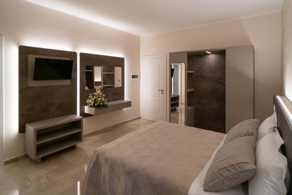 Postel nebo postele na pokoji v ubytování Le margherite B&B