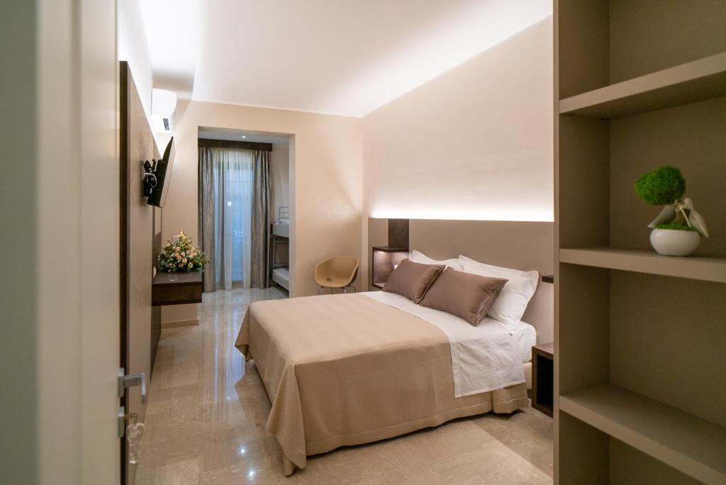 Postel nebo postele na pokoji v ubytování Le margherite B&B