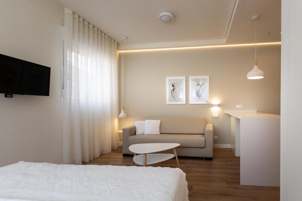 Posteľ alebo postele v izbe v ubytovaní PENSION QUINTA EL RETIRO Habitación tipo Apartamento