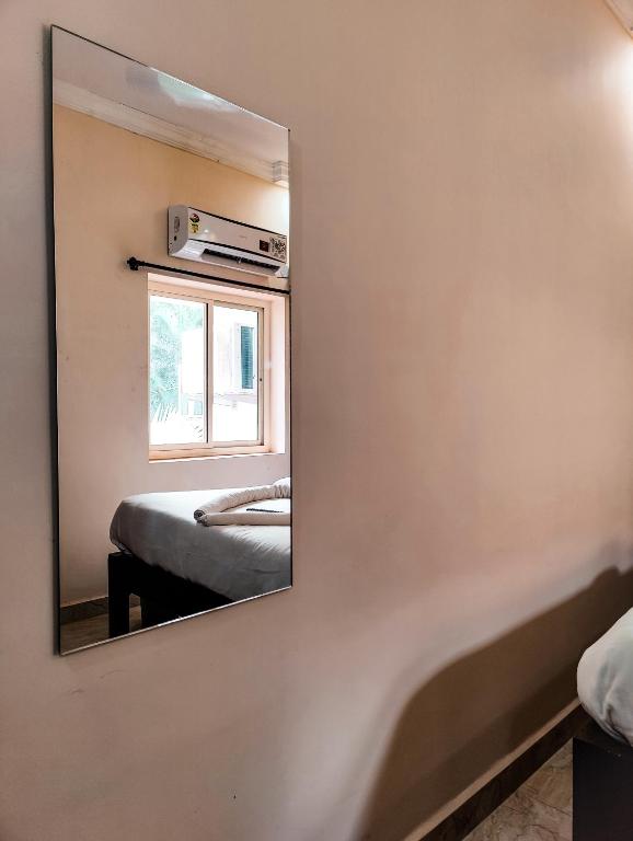 Postel nebo postele na pokoji v ubytování Hotel Candolim Aloft