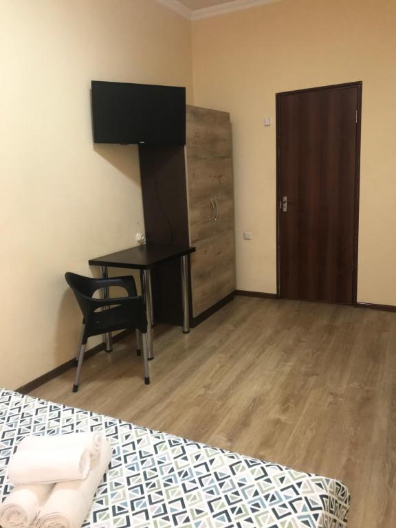 TV a/nebo společenská místnost v ubytování Guesthouse Aygestan