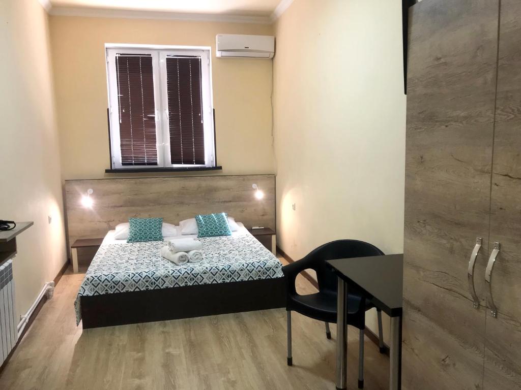 Postel nebo postele na pokoji v ubytování Guesthouse Aygestan