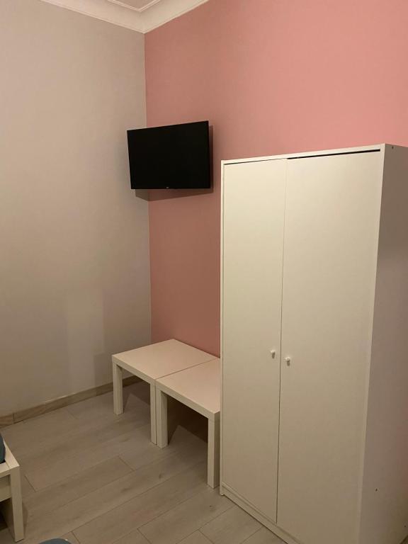 Televízia a/alebo spoločenská miestnosť v ubytovaní Aris Apartment