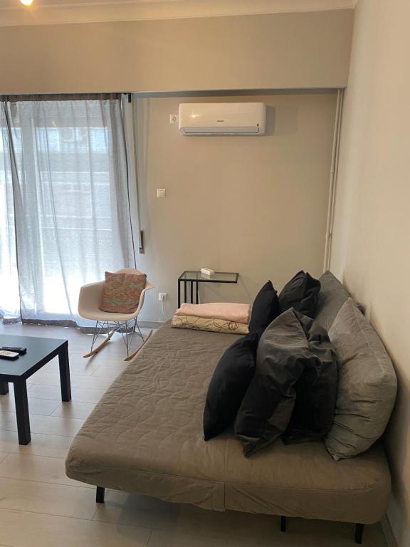 Posteľ alebo postele v izbe v ubytovaní Aris Apartment