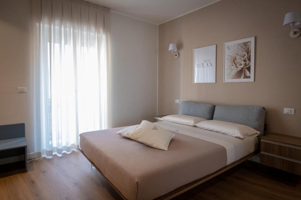 Postel nebo postele na pokoji v ubytování Dimora Donna Dora - Albergo Diffuso