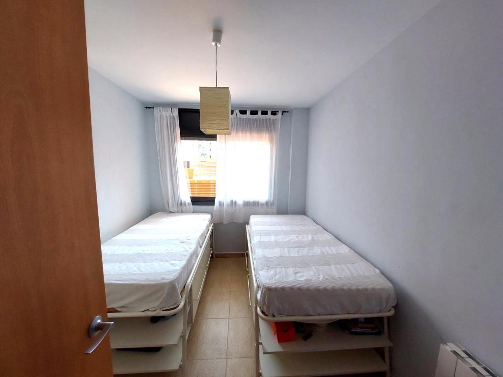 Posteľ alebo postele v izbe v ubytovaní BRAVAHOLIDAYS-201-Pineda