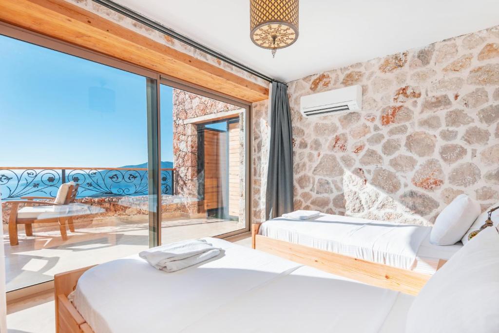 A bed or beds in a room at Villa Ambar