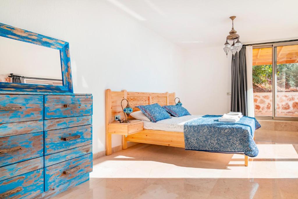A bed or beds in a room at Villa Ambar