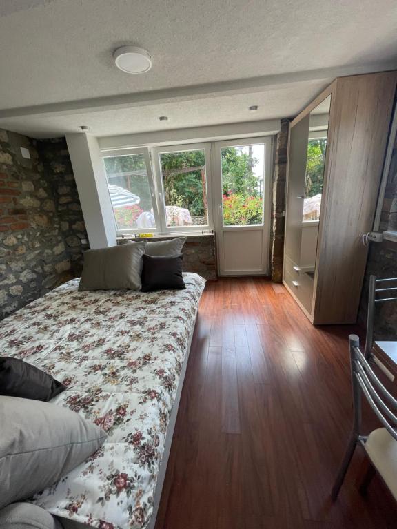 Postel nebo postele na pokoji v ubytování Apartments Surban