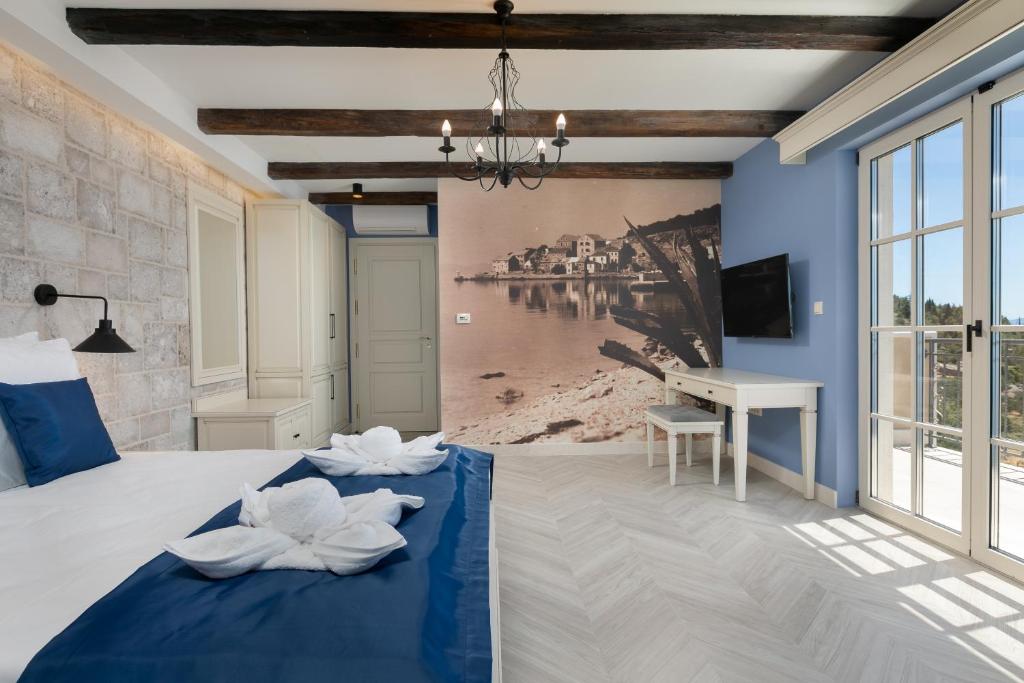 Postel nebo postele na pokoji v ubytování Heritage Hotel Liberan