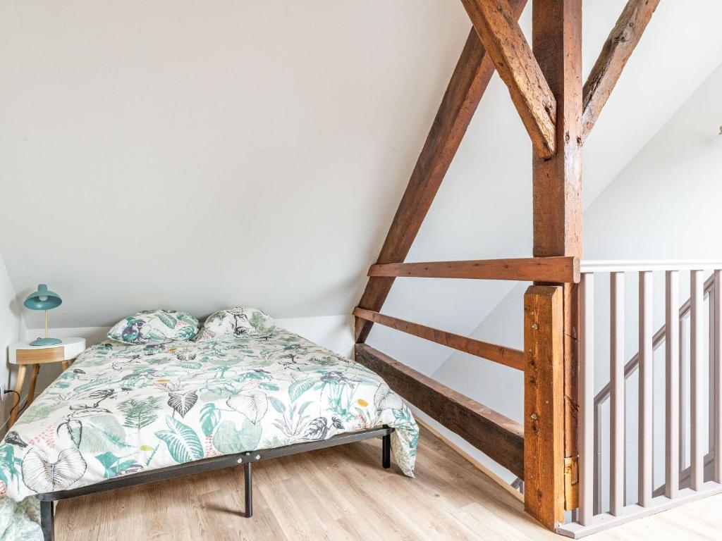 Postel nebo postele na pokoji v ubytování Le Jaudy
