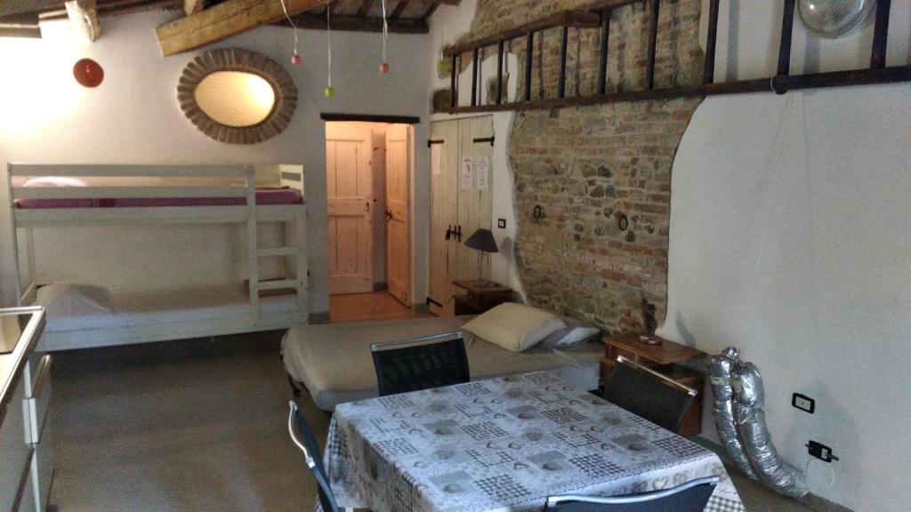 A bed or beds in a room at Rosa Malatestiana