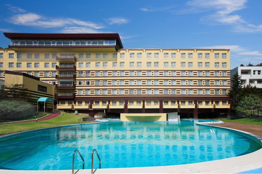 Bazén v ubytování Resort Hotel Tateshina nebo v jeho okolí