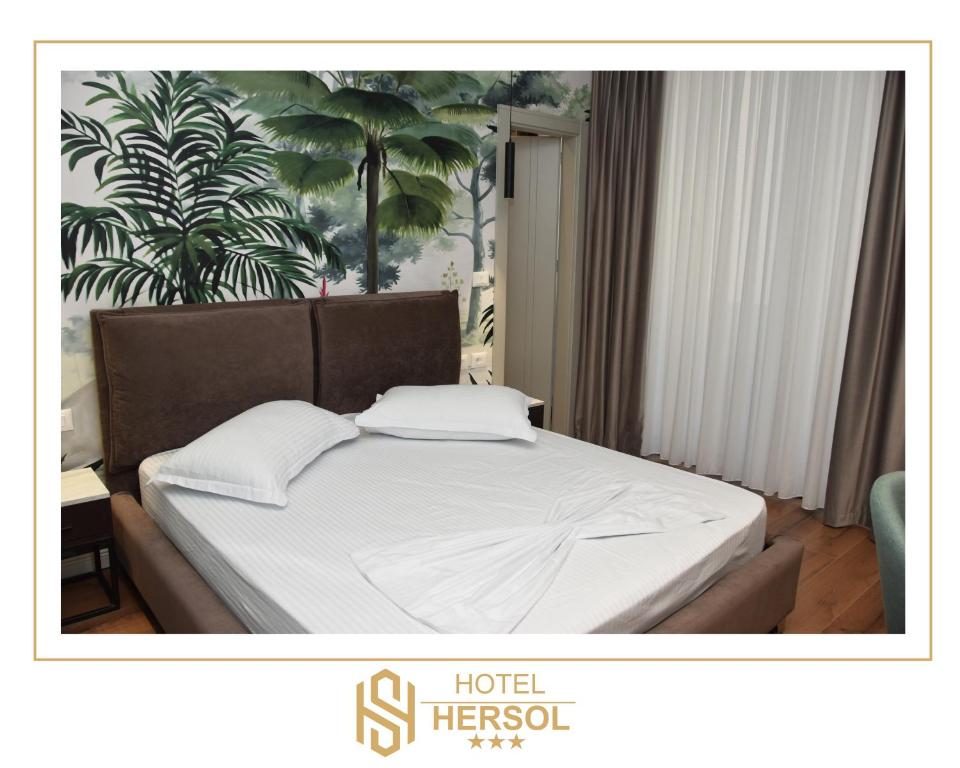 Postel nebo postele na pokoji v ubytování HOTEL HERSOL