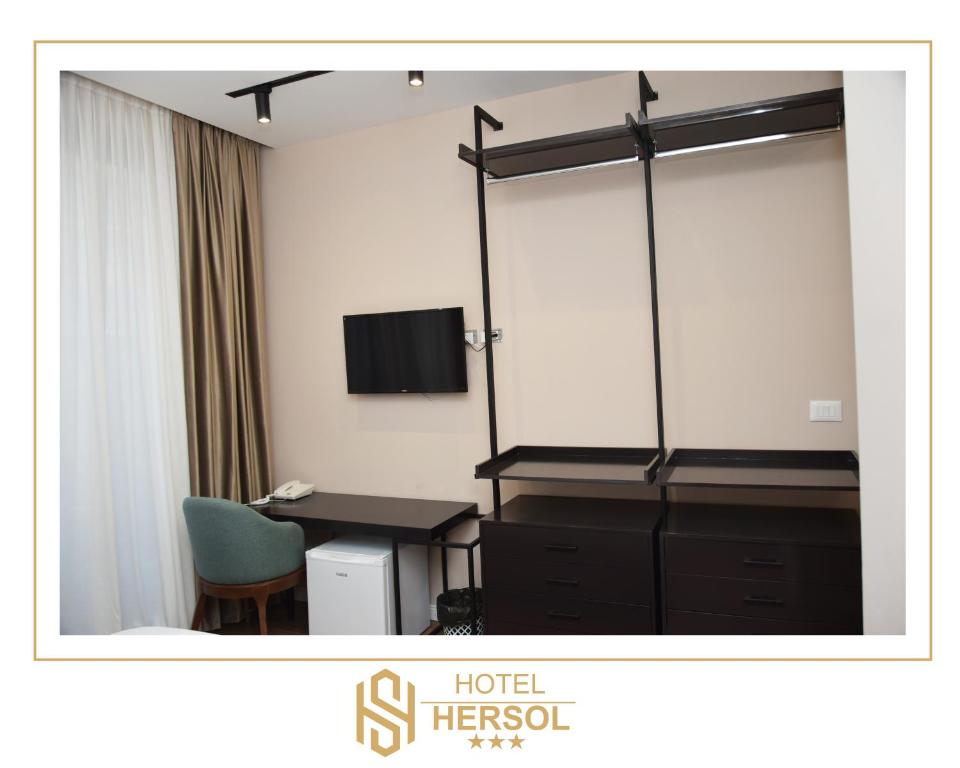 TV a/nebo společenská místnost v ubytování HOTEL HERSOL