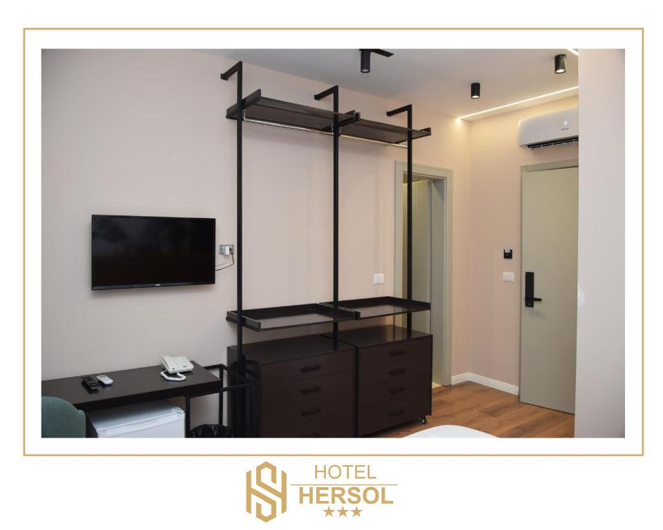 TV a/nebo společenská místnost v ubytování HOTEL HERSOL