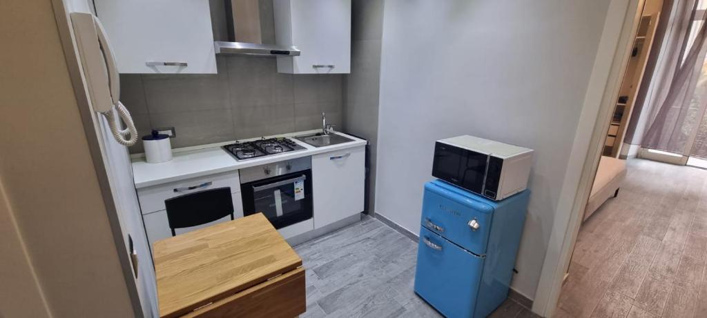 Kuchyňa alebo kuchynka v ubytovaní Centonze Apt - Messina centro