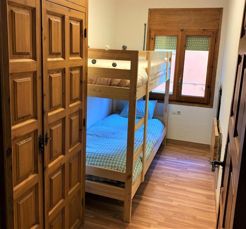 Postel nebo postele na pokoji v ubytování Apartamento en Llivia con piscina