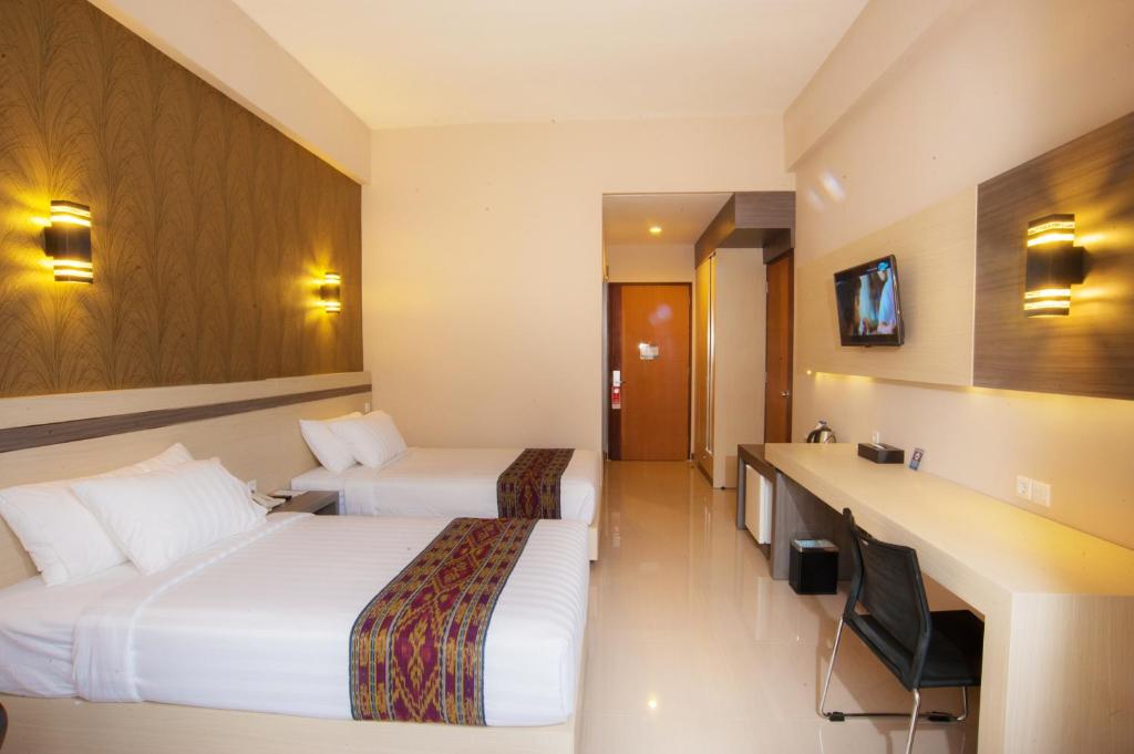 TV a/nebo společenská místnost v ubytování Lombok Raya Hotel