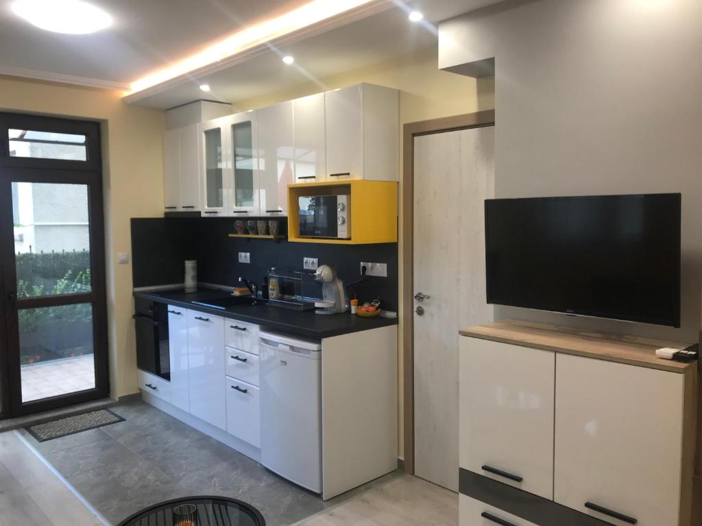 Kuchyň nebo kuchyňský kout v ubytování Sunrise City A2, Sarafovo
