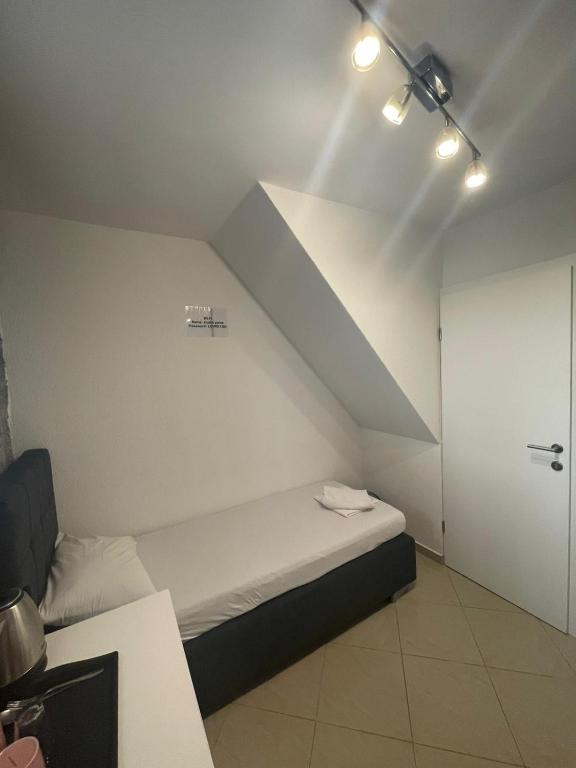 Postel nebo postele na pokoji v ubytování Rooms Pama
