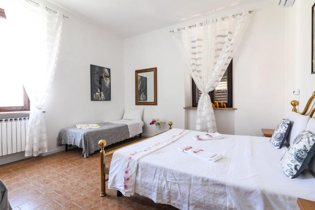 Posteľ alebo postele v izbe v ubytovaní Casa Magrini