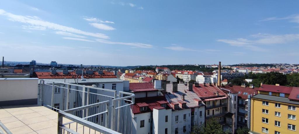 a view of a city from the roof of a building at Penthouse # 81 with panoramic city view in Elite Rezidence with free parking in Prague