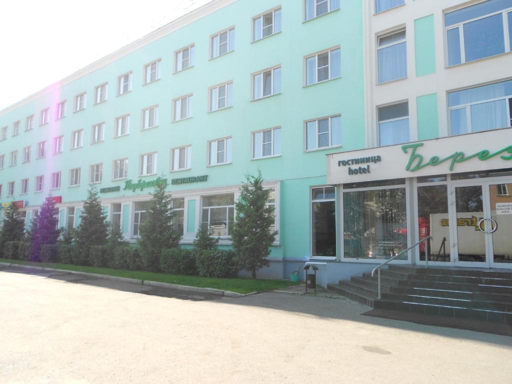 a building with a blue and white building at Hotel Berezka in Vyshny Volochyok