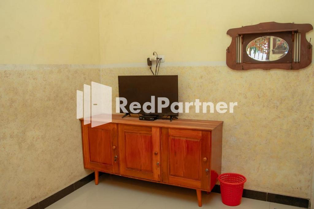 Fotografie z fotogalerie ubytování Flamboyan Asri Syariah Mitra RedDoorz near Kampung Inggris Pare v destinaci Pare
