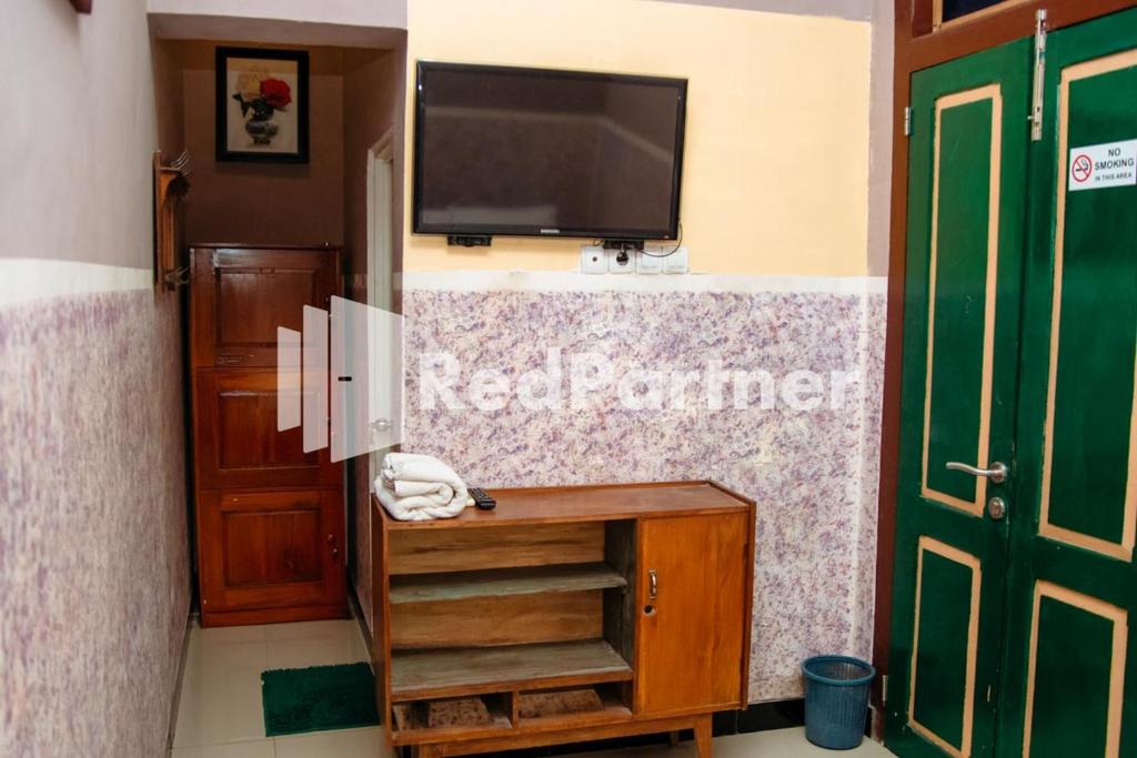 Fotografie z fotogalerie ubytování Flamboyan Asri Syariah Mitra RedDoorz near Kampung Inggris Pare v destinaci Pare