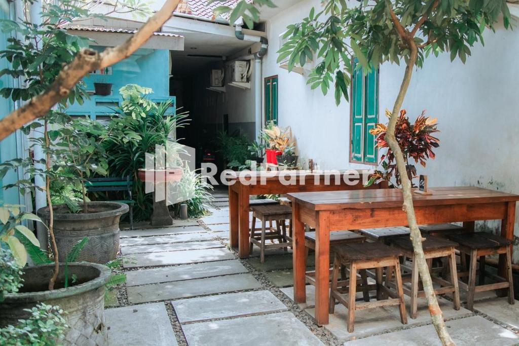 Fotografie z fotogalerie ubytování Flamboyan Asri Syariah Mitra RedDoorz near Kampung Inggris Pare v destinaci Pare