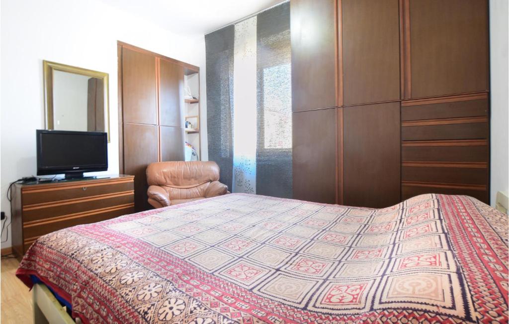 Posteľ alebo postele v izbe v ubytovaní Beautiful Apartment In Follonica