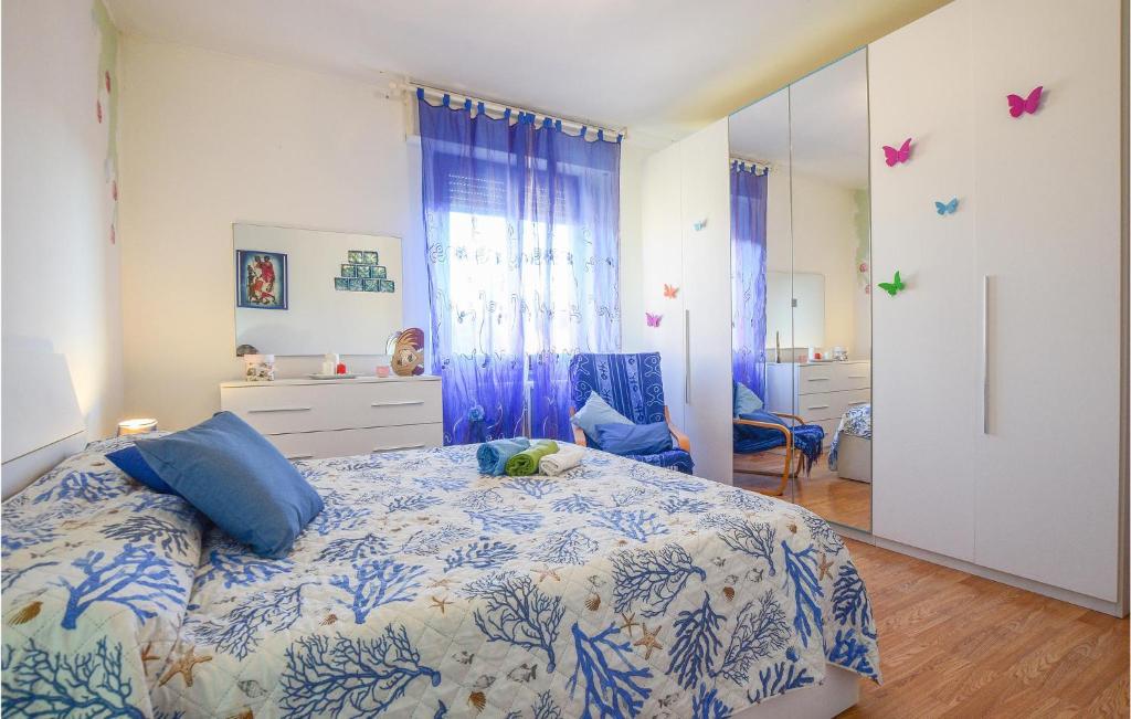 Posteľ alebo postele v izbe v ubytovaní Beautiful Apartment In Follonica