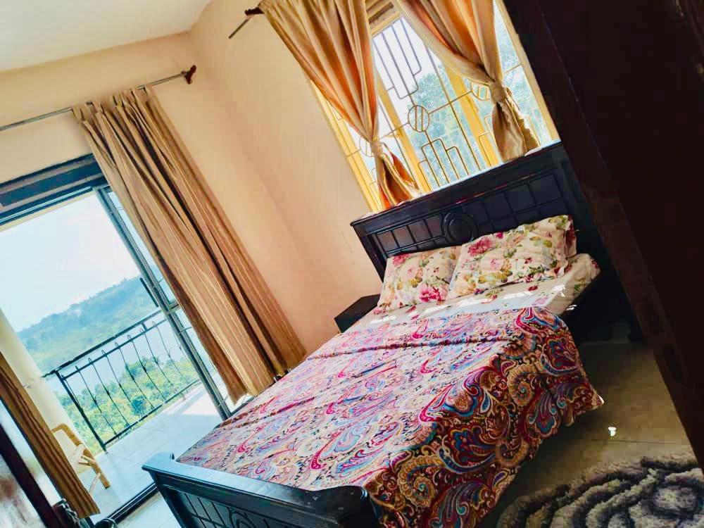 Un pat sau paturi într-o cameră la Saka Laka