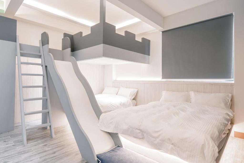 Postel nebo postele na pokoji v ubytování Sweet Summer Homestay
