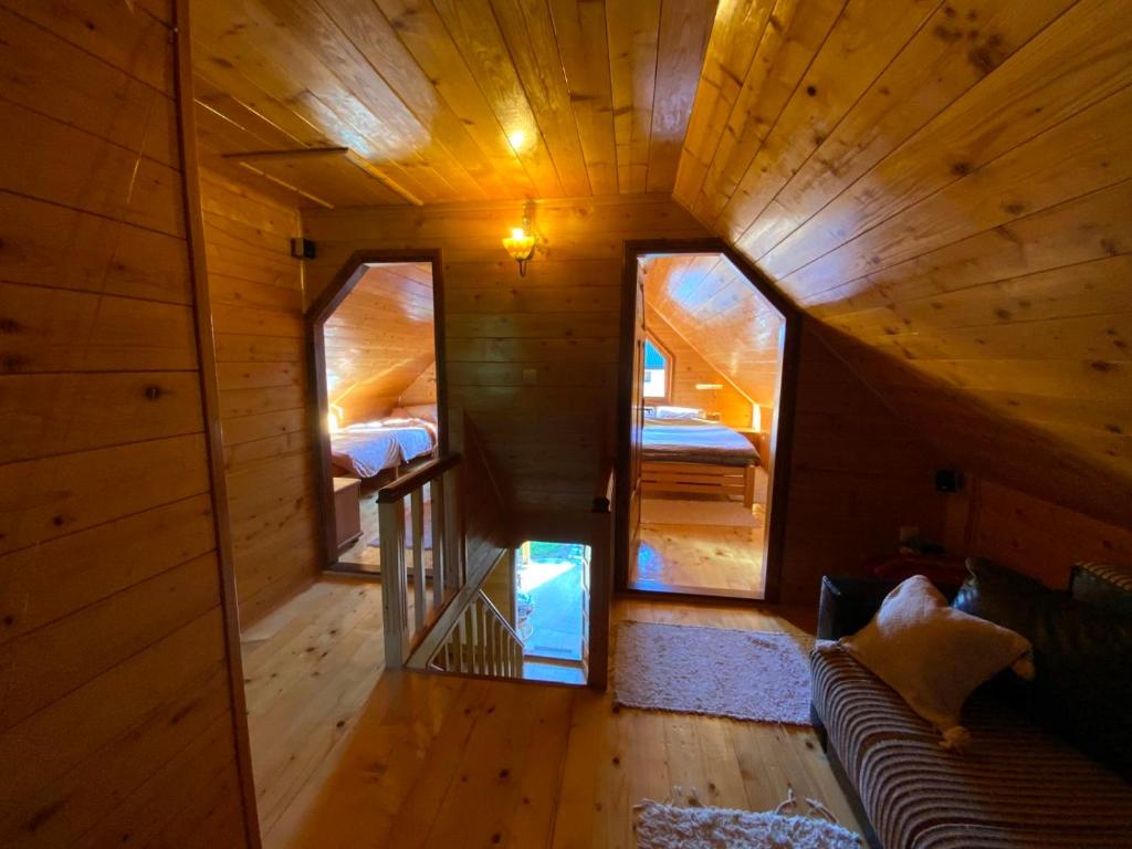 Postel nebo postele na pokoji v ubytování Kolasin Guest House
