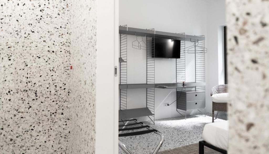Postel nebo postele na pokoji v ubytování Hotel Dolomiti