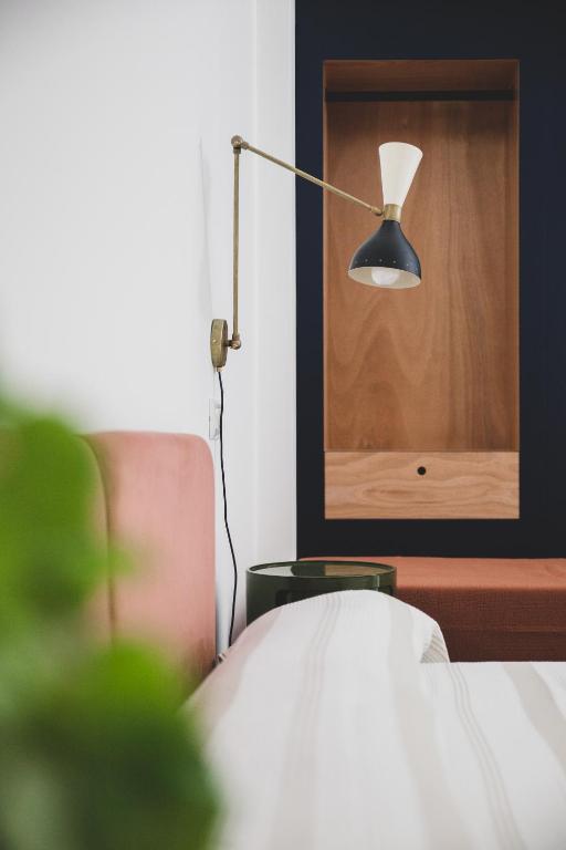 Postel nebo postele na pokoji v ubytování Hotel Dolomiti