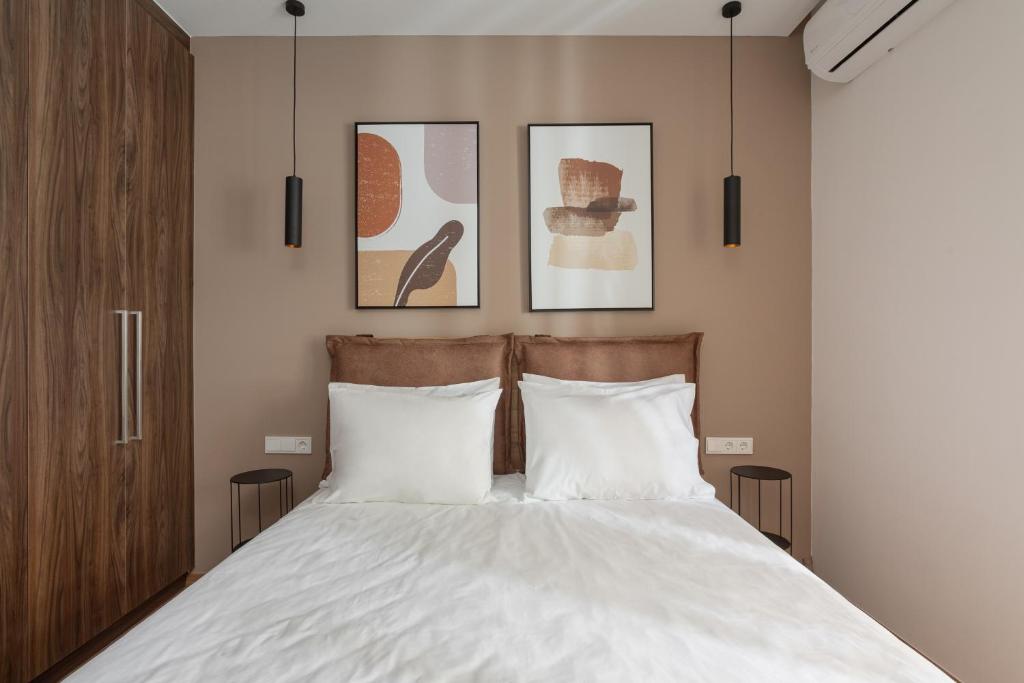 Postel nebo postele na pokoji v ubytování Downtown Luxury Apartment #2