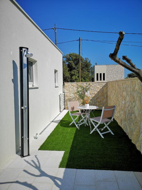 Patio alebo iná vonkajšia časť ubytovania La Villa du Soleil