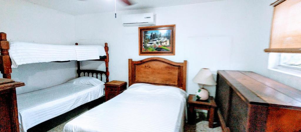 Ένα ή περισσότερα κρεβάτια σε δωμάτιο στο Departamento Riviera