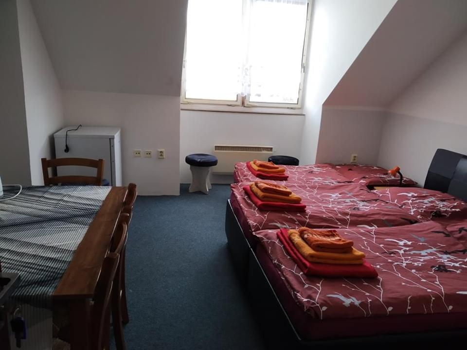 Postel nebo postele na pokoji v ubytování LEO - PENZION