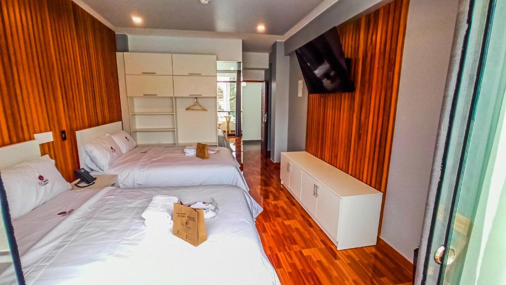 Postel nebo postele na pokoji v ubytování Resort la Fogata Cieneguilla