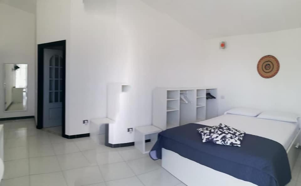 Postel nebo postele na pokoji v ubytování Sulcis Camere