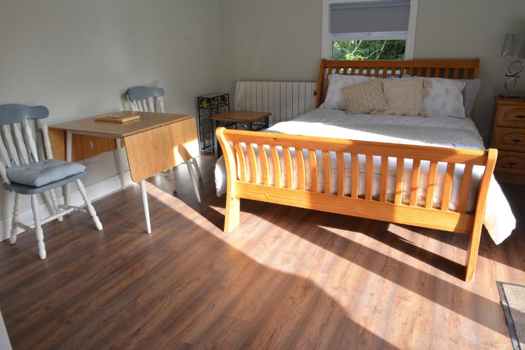 Postel nebo postele na pokoji v ubytování Kingstown House